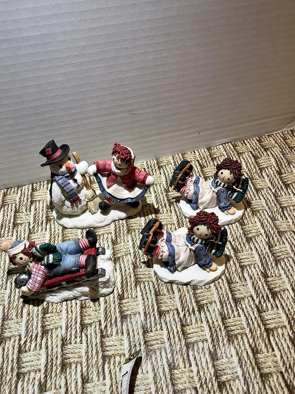 Lot of 4 Enesco Raggedy Ann & Andy collectible winter figurines